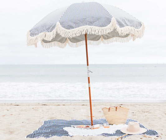 Stranddecke, marineblau gestreift