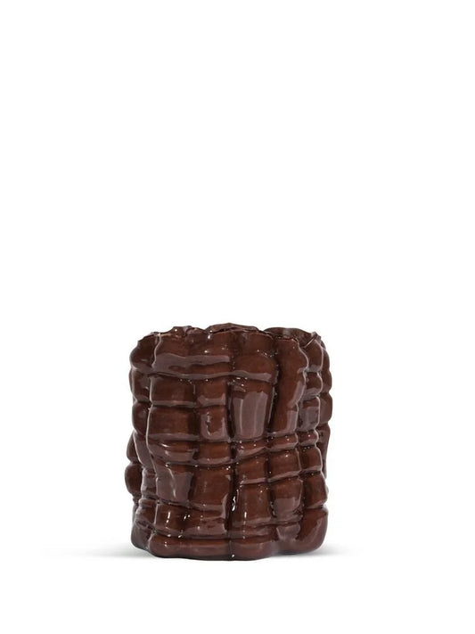 Brun ljuslykta från Byon mot vit bakgrund