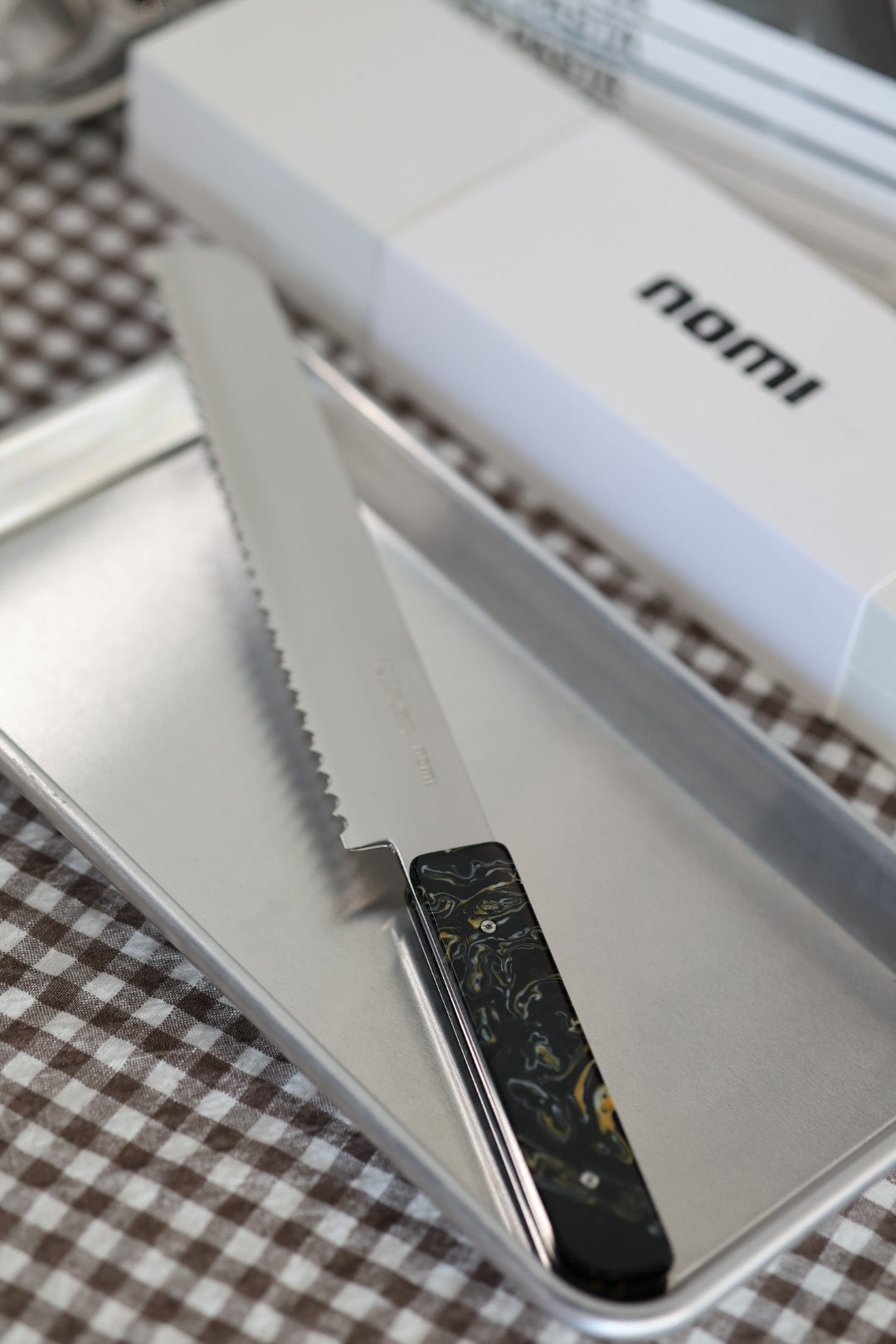 Nomi Brotmesser Glut