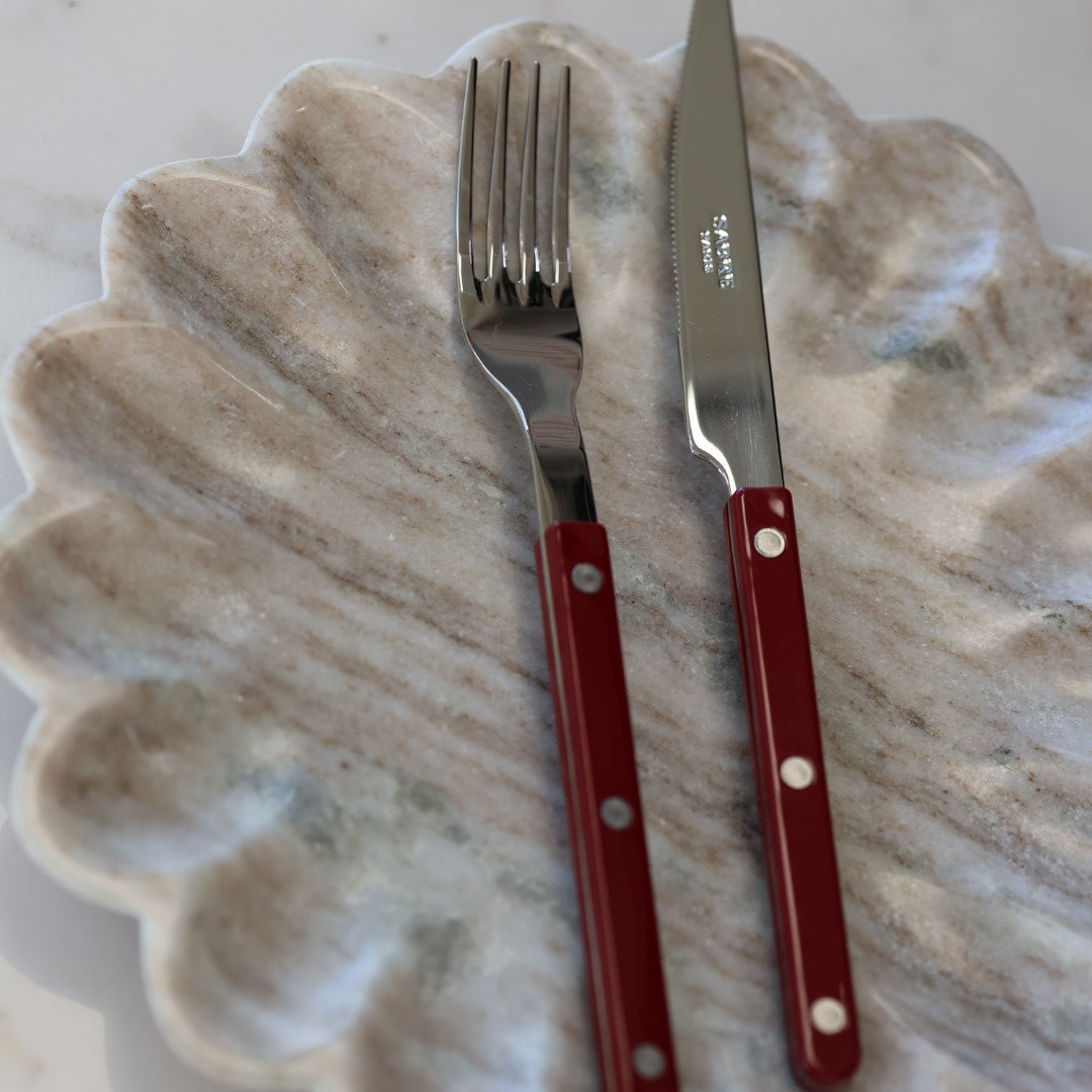 Set di posate Sabre Paris da 24 pezzi, colore bordeaux.