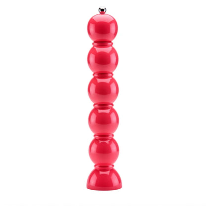 stor vattenmelonrosa pepparkvarn mot vit bakgrund