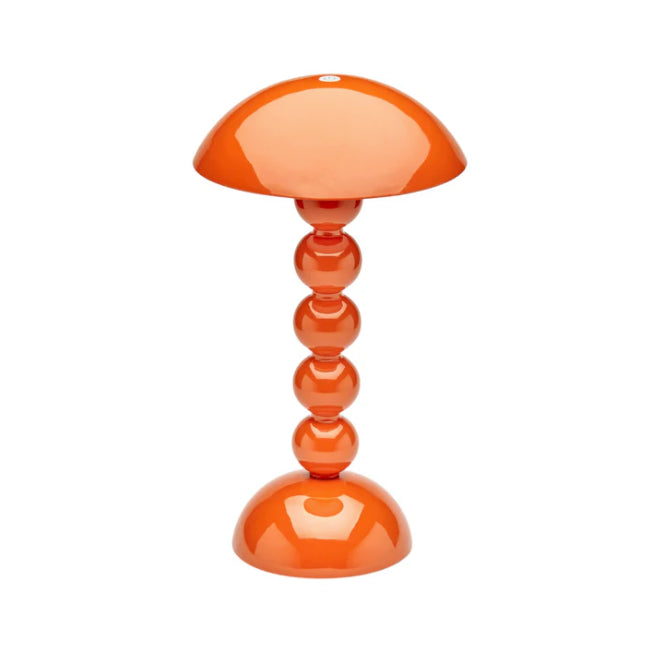 Orange portabel ledlampa på fot mot vit bakgrund