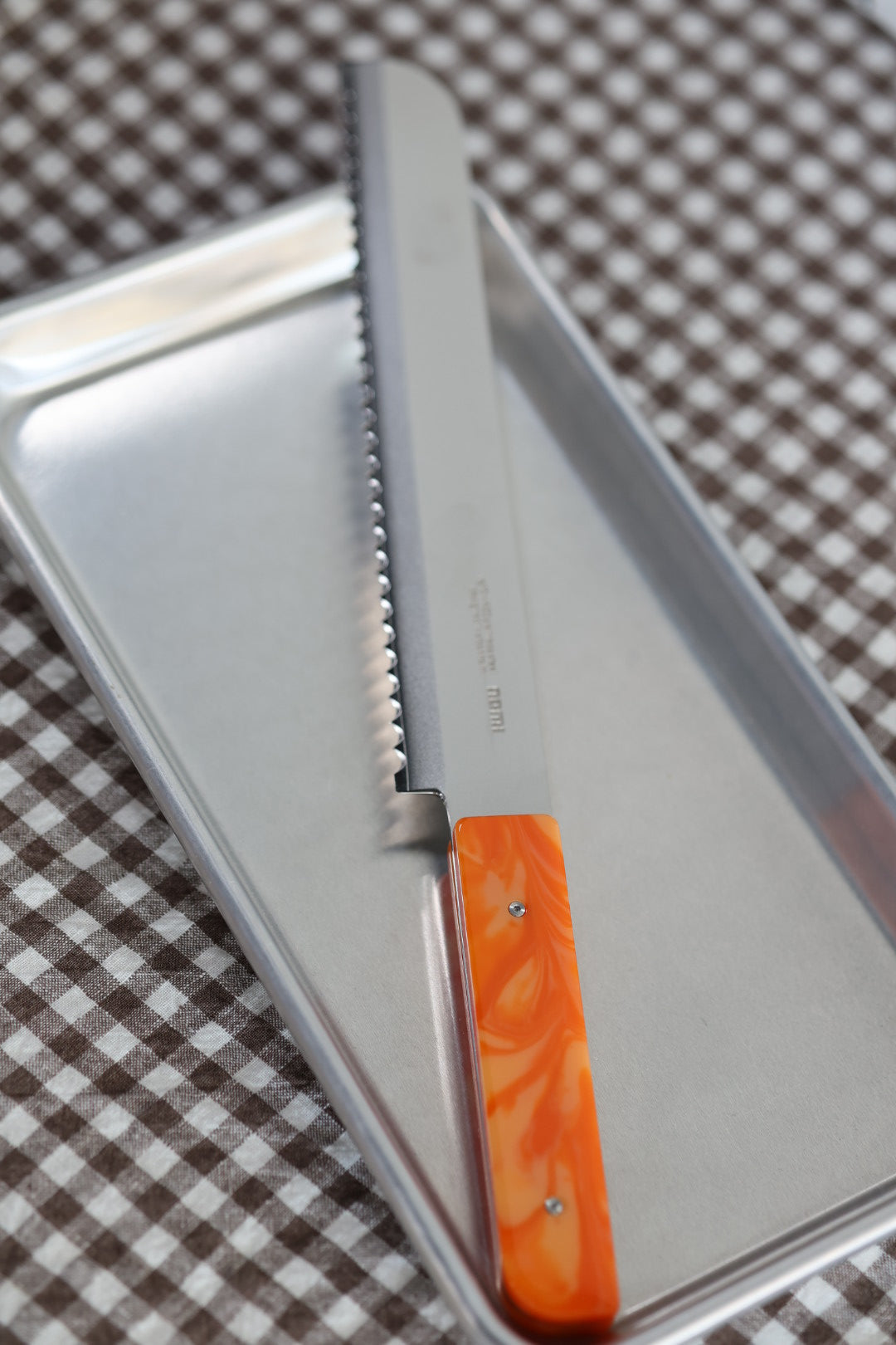 Nomi Brotmesser Mandarine