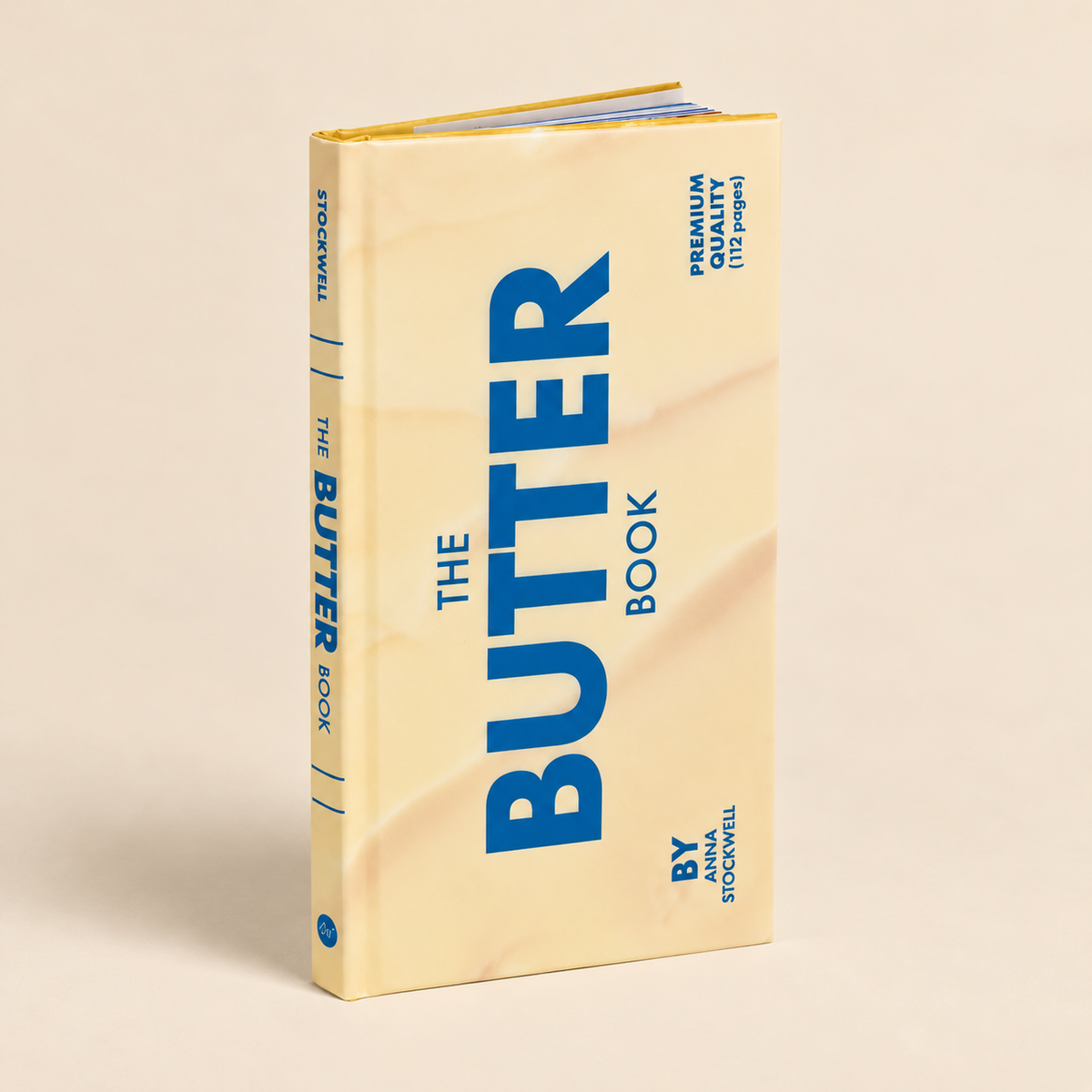 The Butter Book av Anna Stockwell, kokbok med 112 sidor och omslag inspirerat av ett smörpaket.