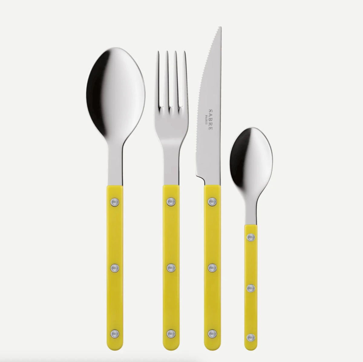 sabre bistrot bestickset gul mot vit bakgrund